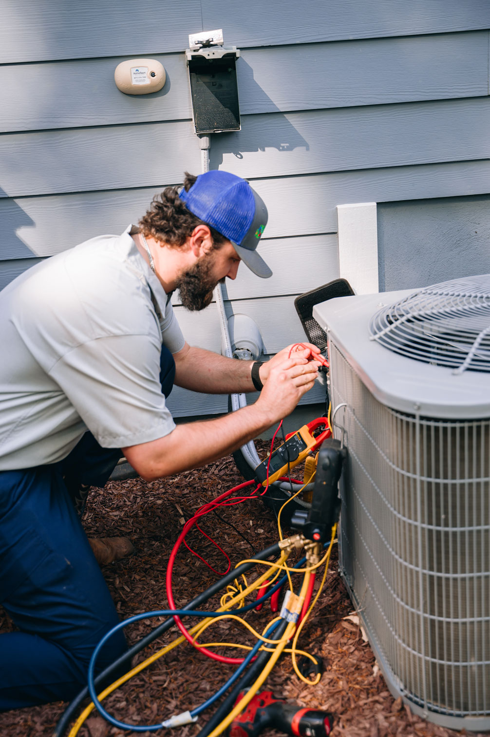 HVAC repair on a home air conditioning unit